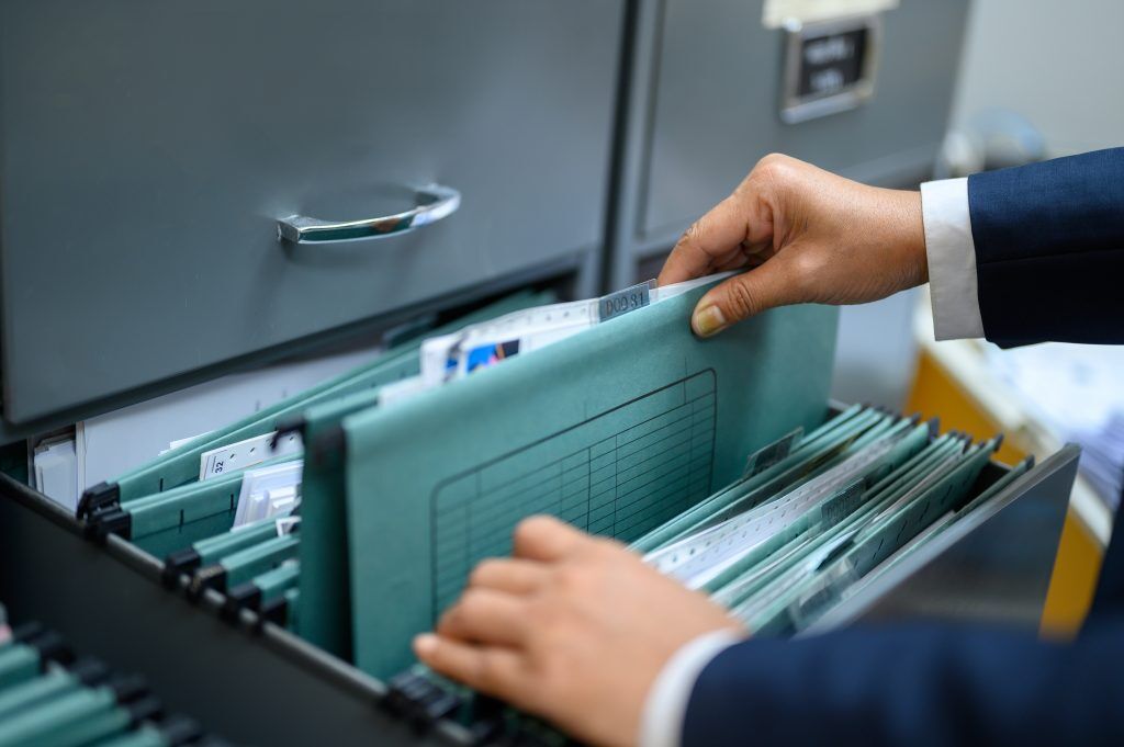 Where Can I Find Reputable Aircon Company In Singapore? 7 employees are managing documents office